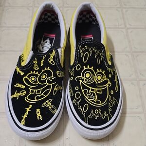 Vans Black and Yellow Slip-On Loafers with Cartoon Illustrations